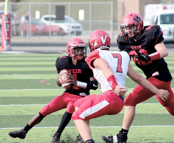 Weir stands tall